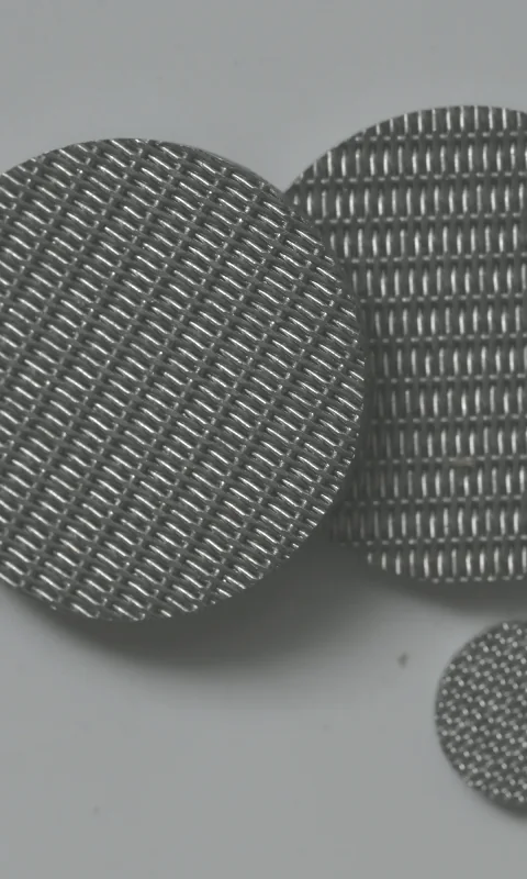 Macro view of sintered woven metal mesh discs for semiconductor filtration
