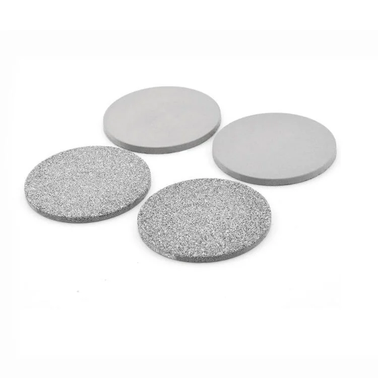 Sintered stainless steel porous discs showing different pore structures and surface textures