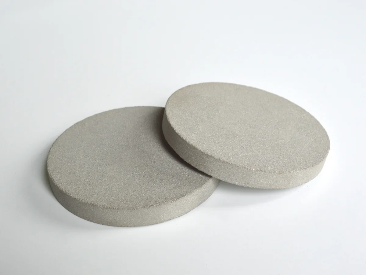 Sintered porous metal discs, thick pair