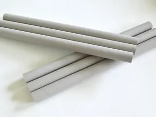 Sintered porous metal tubes in a crossed arrangement