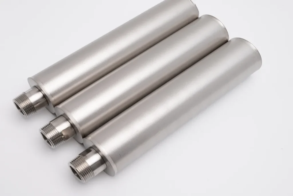 Sintered powder filter cartridges for pharmaceutical manufacturing