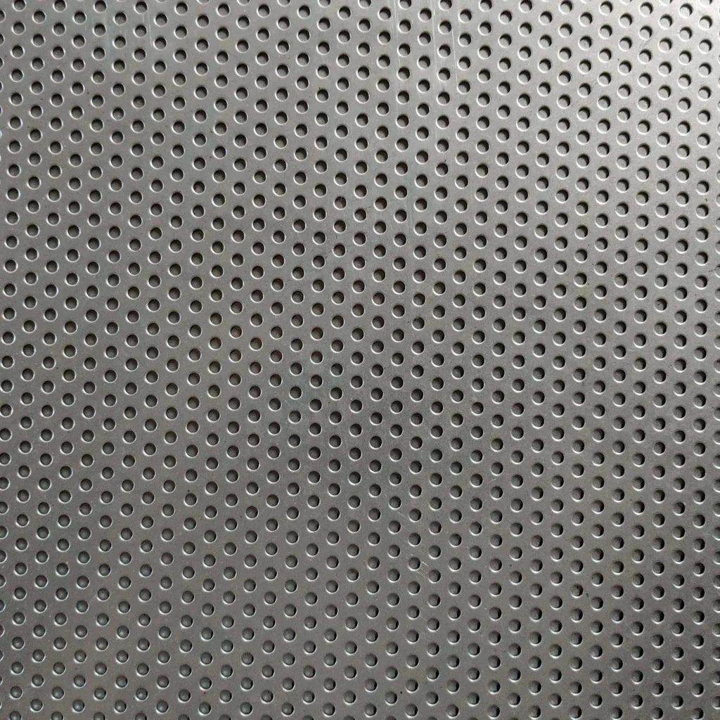 Close-up of round-hole staggered pattern on titanium perforated sheet