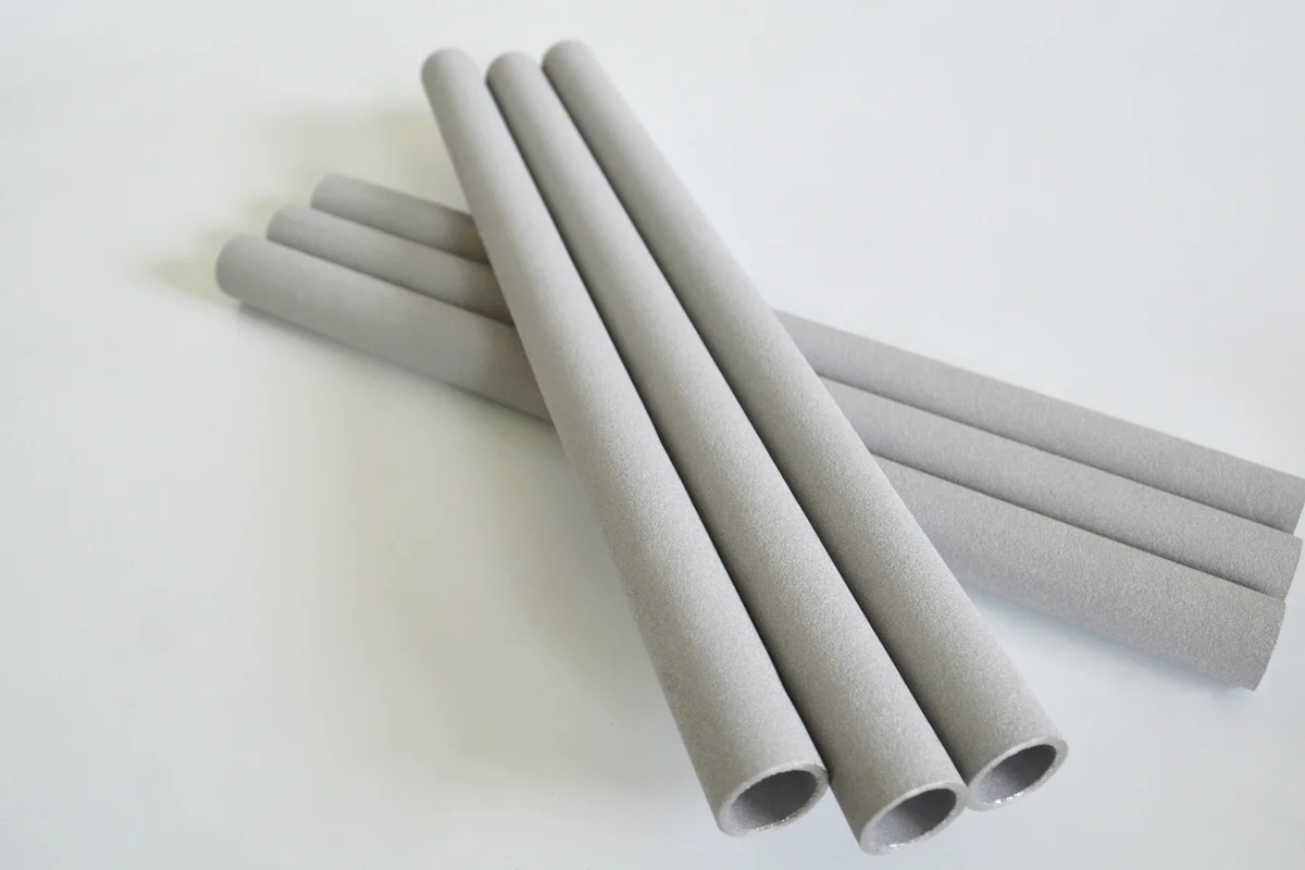 Sintered porous metal tubes used as spargers and gas distribution elements